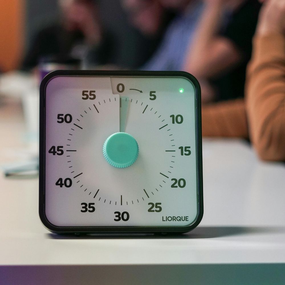 timer sitting on a white desk